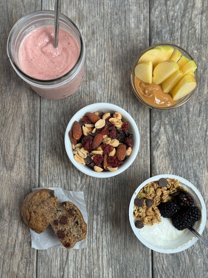 Snack Foods For Work: Mixed Nuts, Muffins, Yogurt and Granola with berries