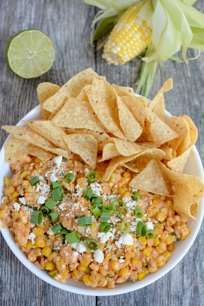 Mexican street corn dip served with chips